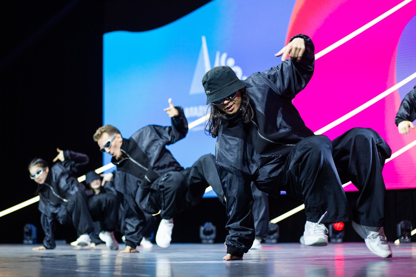 Dancers performing together on stage
